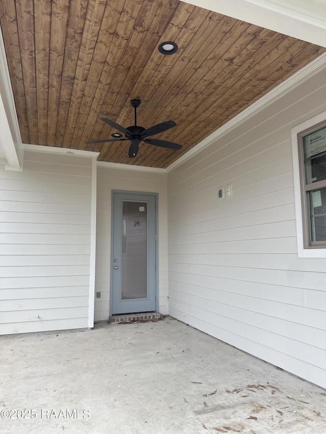 property entrance featuring a patio and ceiling fan