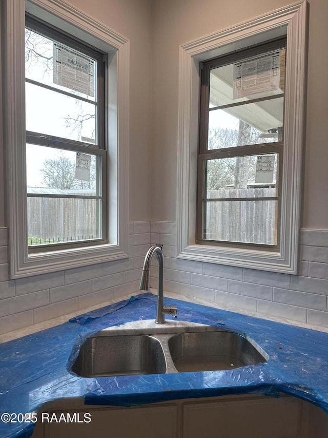 kitchen with sink and backsplash