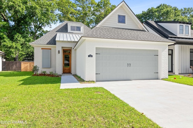 view of front facade with a front lawn, fence, roof with shingles, an attached garage, and driveway
