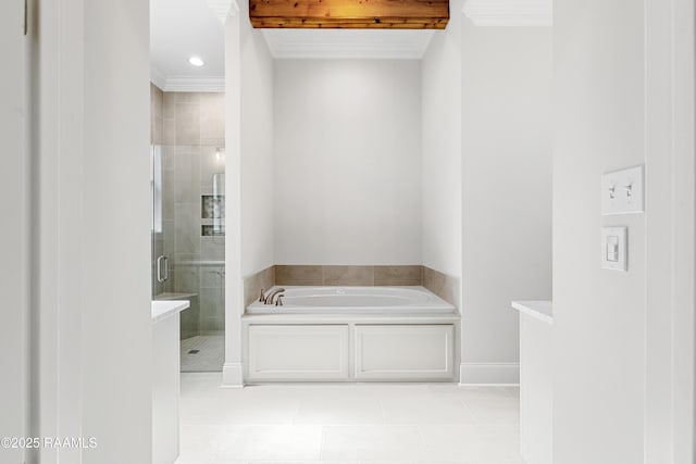 full bath with tile patterned floors, a bath, ornamental molding, and a shower stall