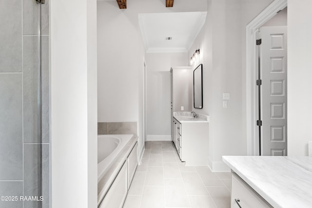 bathroom featuring crown molding, tile patterned flooring, vanity, baseboards, and a bath
