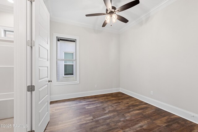 unfurnished bedroom featuring baseboards, ornamental molding, ceiling fan, and dark wood-type flooring