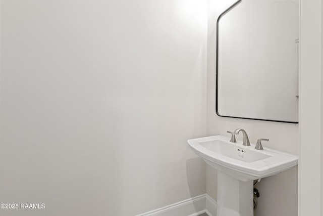 bathroom featuring baseboards