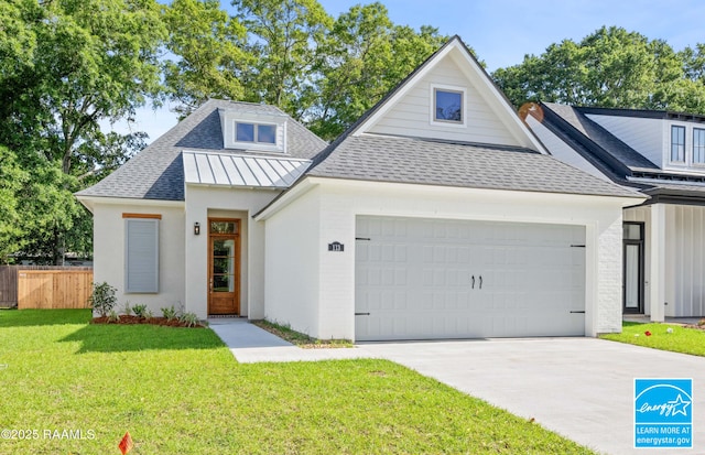view of front facade featuring a garage, fence, a shingled roof, and a standing seam roof
