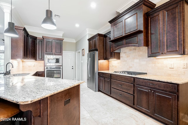 kitchen featuring sink, stainless steel appliances, pendant lighting, decorative backsplash, and ornamental molding