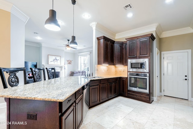 kitchen with kitchen peninsula, dark brown cabinetry, stainless steel appliances, crown molding, and sink