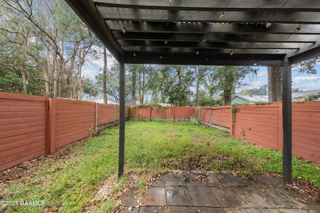 1611 W University Ave, Lafayette, LA 70506 - fenced backyard featuring a pergola and a patio area