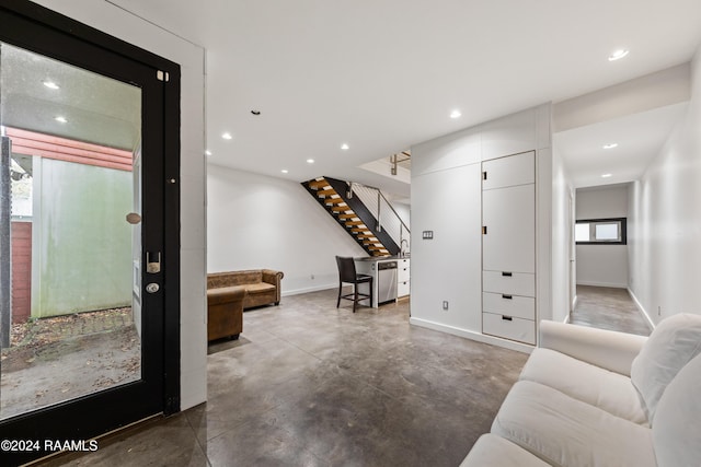 1611 W University Ave, Lafayette, LA 70506 - living area featuring stairway, recessed lighting, and finished concrete floors