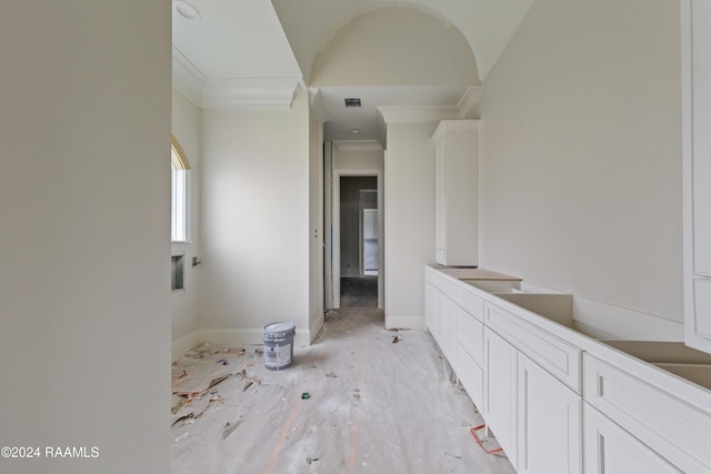 bathroom with crown molding