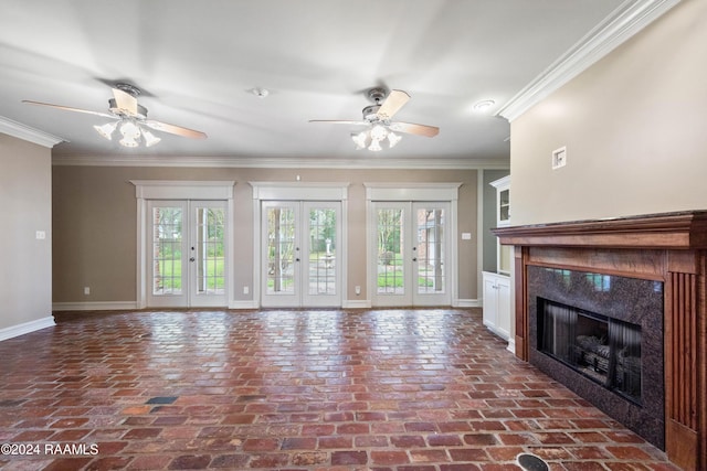 unfurnished living room with french doors and ornamental molding