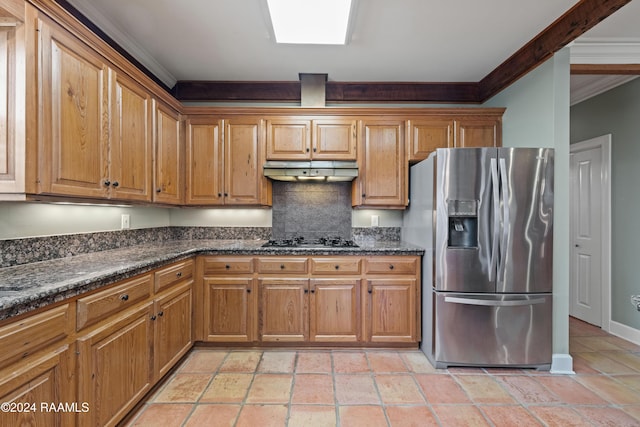 1013 Bayou Bend Cir, Breaux Bridge, LA 70517 - kitchen with stainless steel fridge, gas stovetop, ornamental molding, under cabinet range hood, and brown cabinets