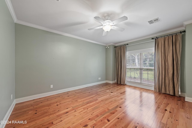 1013 Bayou Bend Cir, Breaux Bridge, LA 70517 - spare room with light wood-style flooring, crown molding, and a ceiling fan