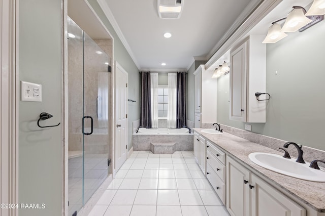bathroom featuring tile patterned floors, vanity, separate shower and tub, and crown molding