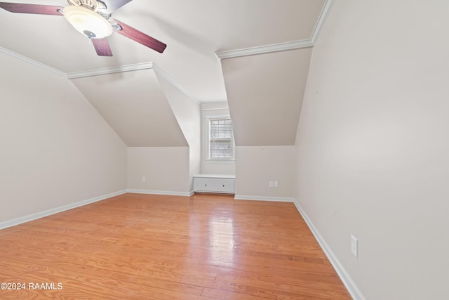 additional living space with light wood-type flooring, ceiling fan, and lofted ceiling