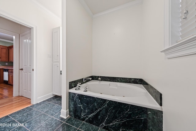 1013 Bayou Bend Cir, Breaux Bridge, LA 70517 - bathroom featuring crown molding, a tub with jets, and tile patterned floors