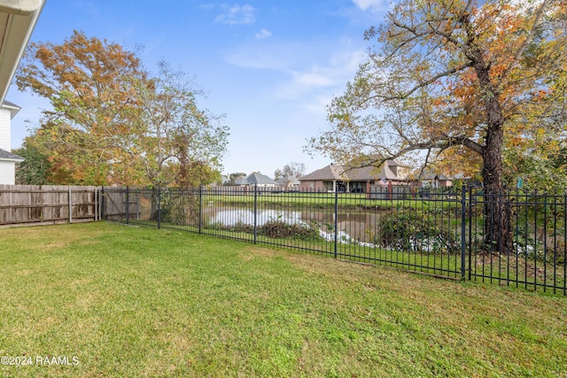 view of yard with a water view