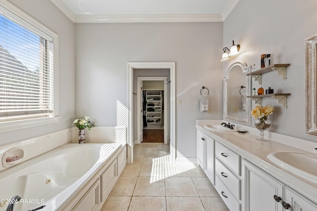 bathroom featuring a tub to relax in, crown molding, tile patterned flooring, and vanity