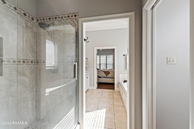 bathroom with tile patterned floors and an enclosed shower