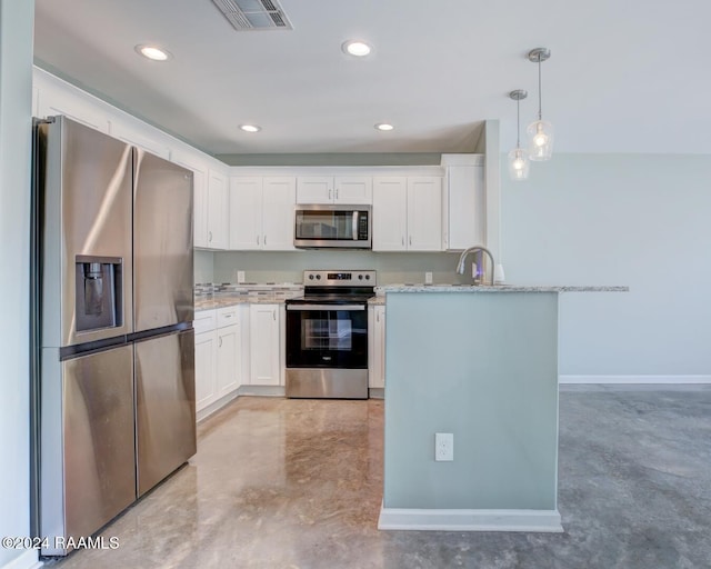 kitchen with pendant lighting, sink, light stone countertops, white cabinetry, and stainless steel appliances