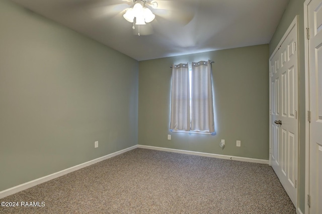 unfurnished bedroom featuring carpet flooring and ceiling fan