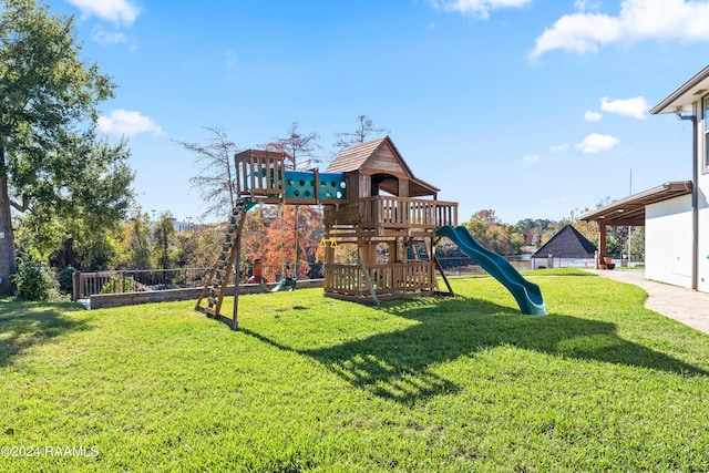 view of jungle gym featuring a yard