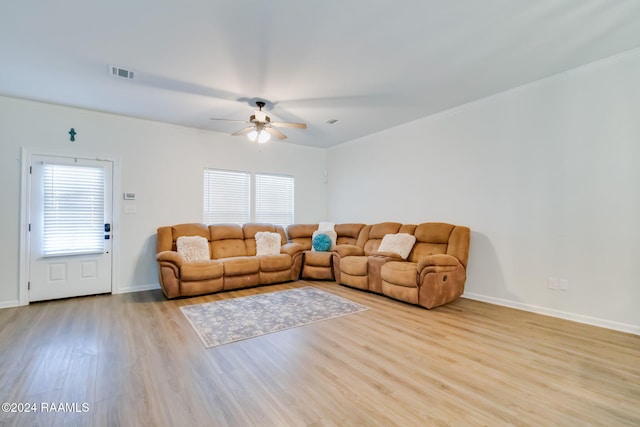 104 Whittington Dr Unit M, Lafayette, LA 70503 - living room featuring light wood-style flooring, ornamental molding, and ceiling fan