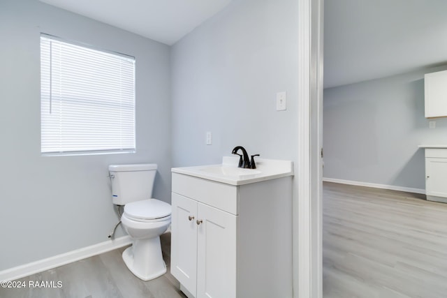 807 American Legion Dr, Rayne, LA 70578 - bathroom featuring vanity and wood finished floors