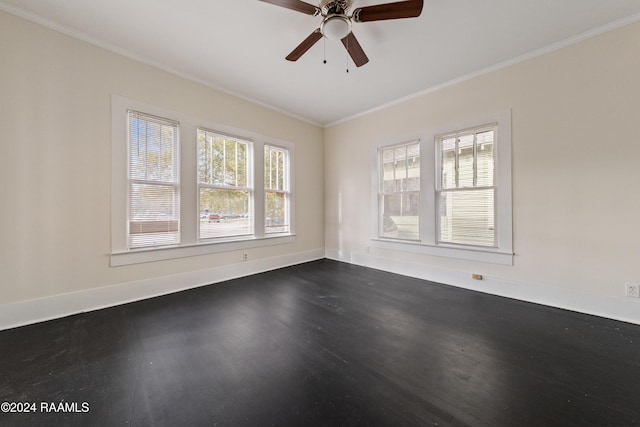 spare room featuring ceiling fan, dark hardwood / wood-style flooring, and ornamental molding