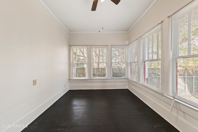 unfurnished sunroom featuring plenty of natural light and ceiling fan