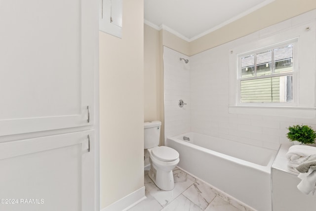 bathroom featuring toilet, tiled shower / bath, and ornamental molding