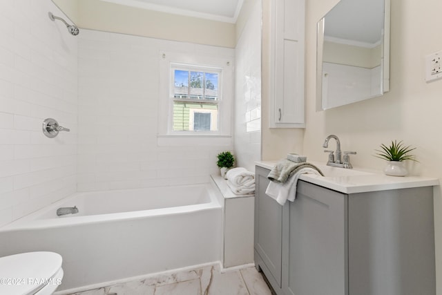 bathroom with vanity, toilet, and crown molding