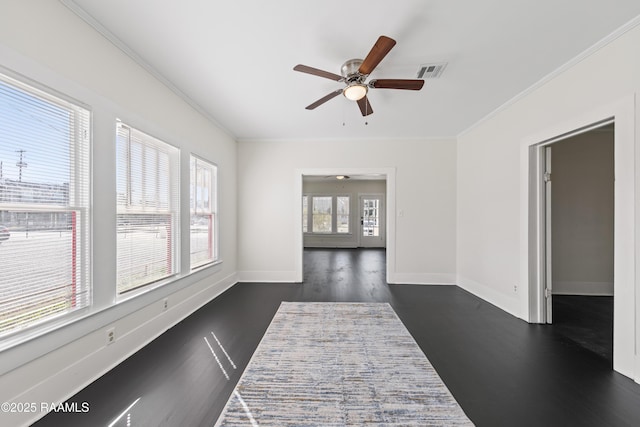 interior space featuring dark hardwood / wood-style flooring and ornamental molding