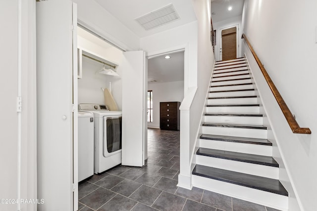 laundry room with washer and dryer