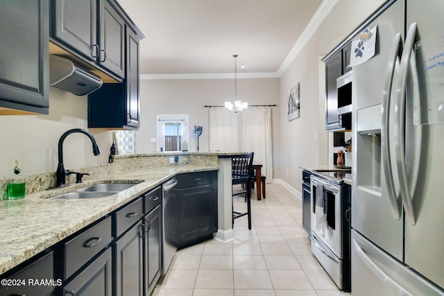 kitchen featuring sink, a notable chandelier, pendant lighting, light tile patterned flooring, and appliances with stainless steel finishes