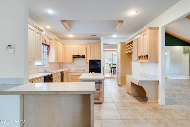 kitchen featuring light brown cabinets, black appliances, sink, tile counters, and kitchen peninsula