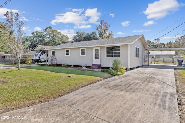 903 S Shireview Cir, Abbeville, LA 70510 - ranch-style home with entry steps, concrete driveway, a shingled roof, and a front yard