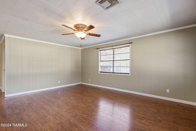 903 S Shireview Cir, Abbeville, LA 70510 - empty room with a ceiling fan, dark wood finished floors, and crown molding