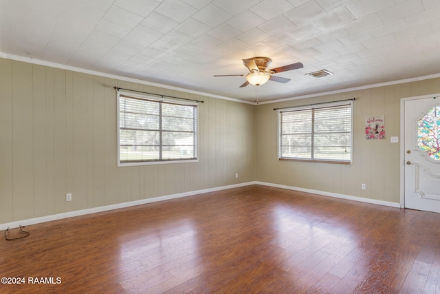 903 S Shireview Cir, Abbeville, LA 70510 - empty room featuring wood finished floors, crown molding, and ceiling fan