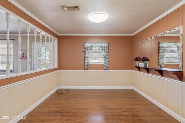 903 S Shireview Cir, Abbeville, LA 70510 - spare room featuring wood finished floors and crown molding