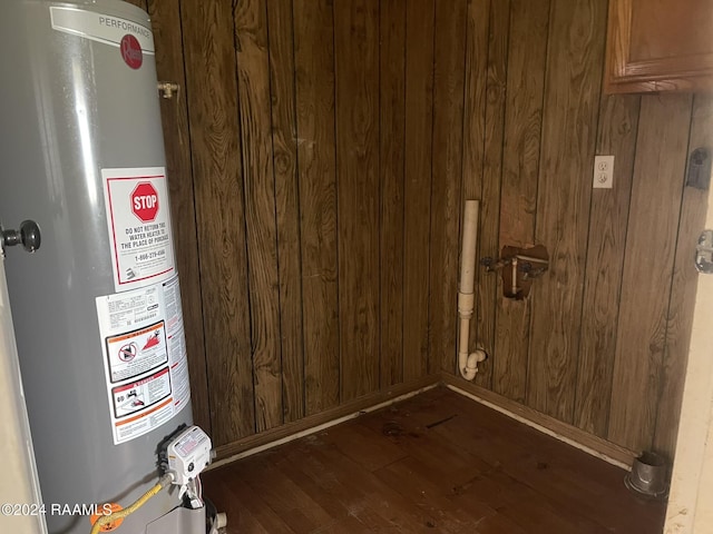 utility room with water heater