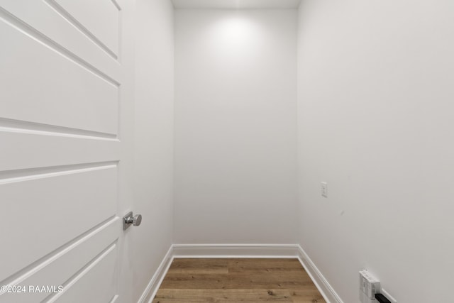 400 Croft, Lafayette, LA 70503 - laundry area with wood finished floors and baseboards