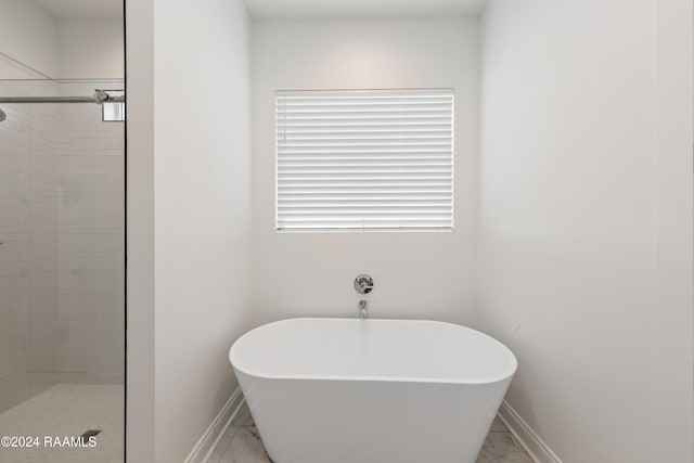 400 Croft, Lafayette, LA 70503 - bathroom with a freestanding tub, a stall shower, and marble look tiles