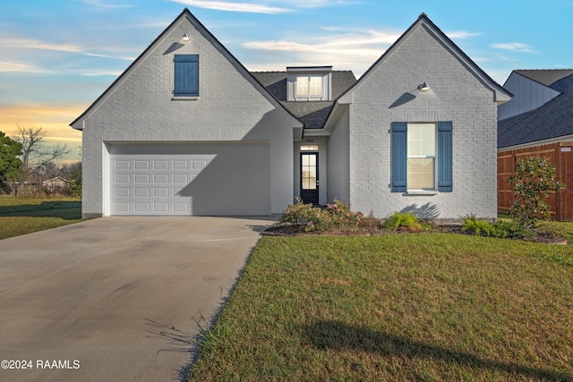 view of front of house with a yard