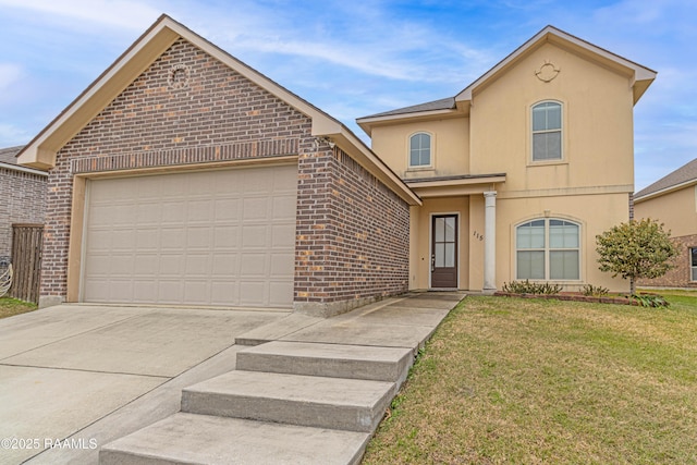 view of property with a garage and a front yard