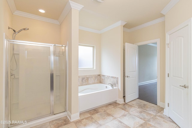 bathroom featuring ornamental molding and independent shower and bath