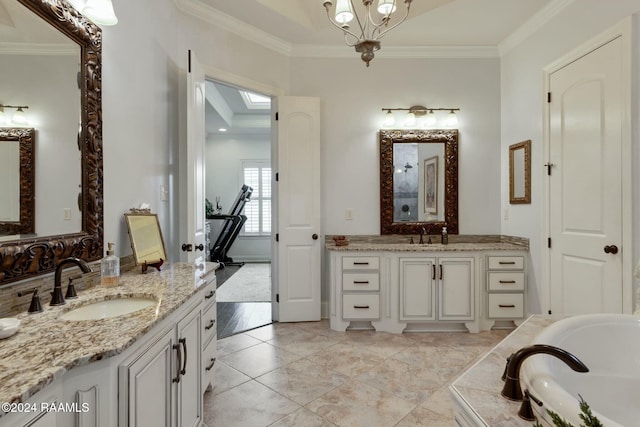 bathroom with vanity, a bathing tub, tile patterned floors, ornamental molding, and a chandelier