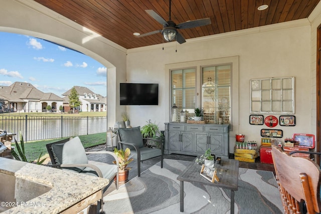 view of patio / terrace featuring ceiling fan