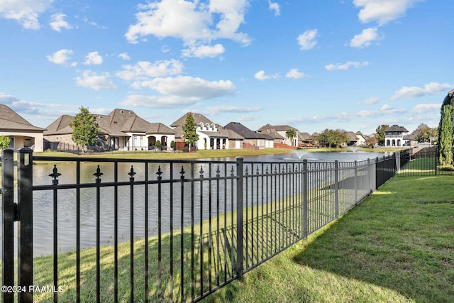 view of yard with a water view