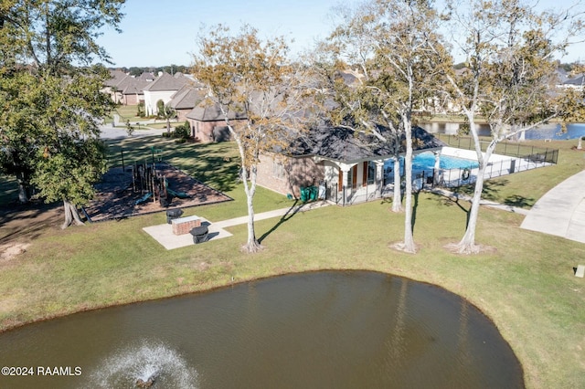 birds eye view of property featuring a water view