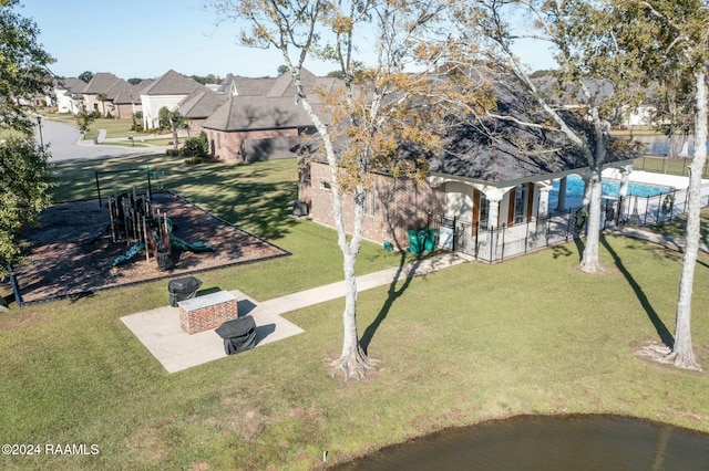 bird's eye view with a water view